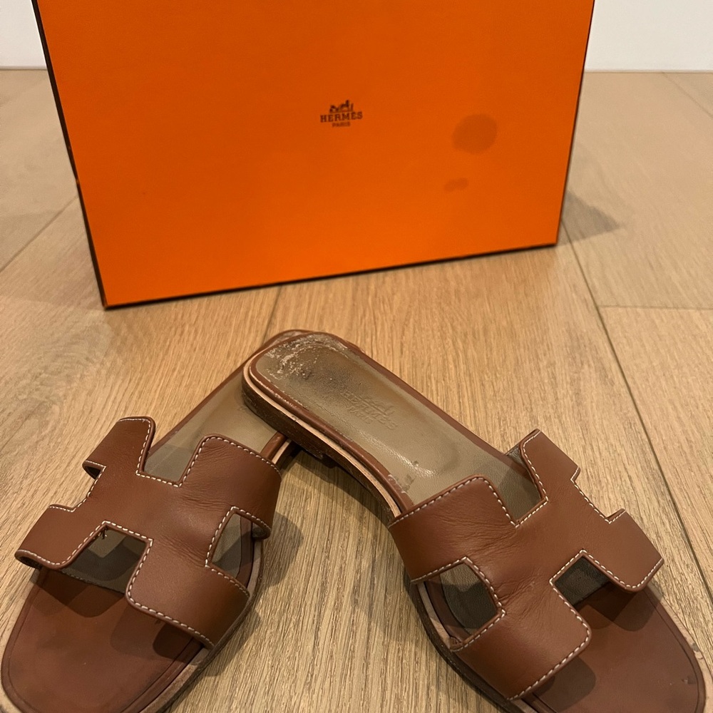 Hermes Oran Sandals in Gold